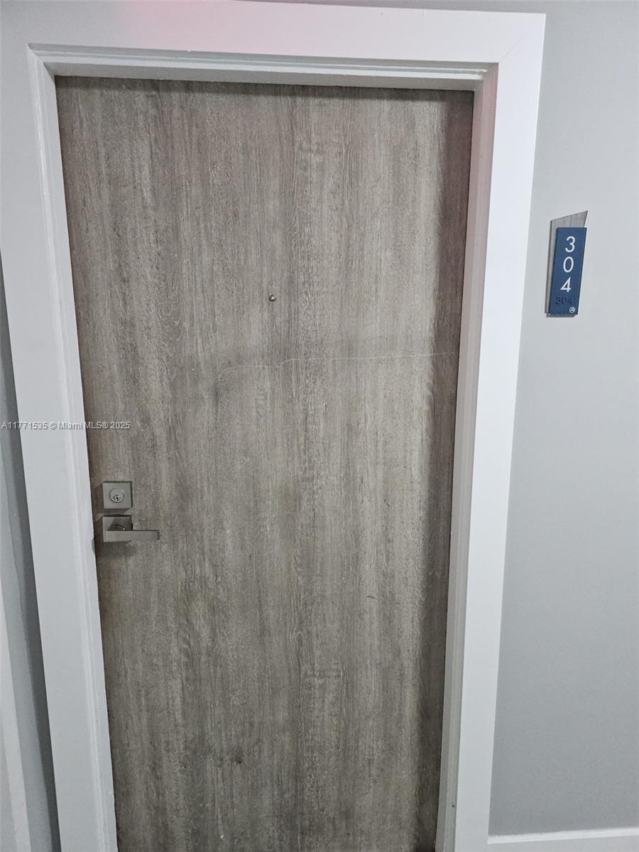 8101 Crespi Boulevard, Unit 304 Miami Beach, FL 33141 - Photo 17 of 25 a close view of shower curtain