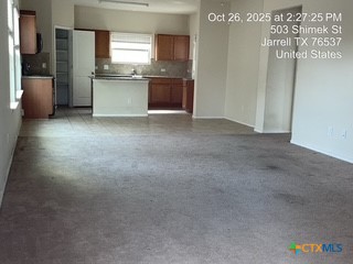 503 Shimek Street, Unit 26C Jarrell, TX 76537 - Photo 3 of 22 Open living,dining and kitchen