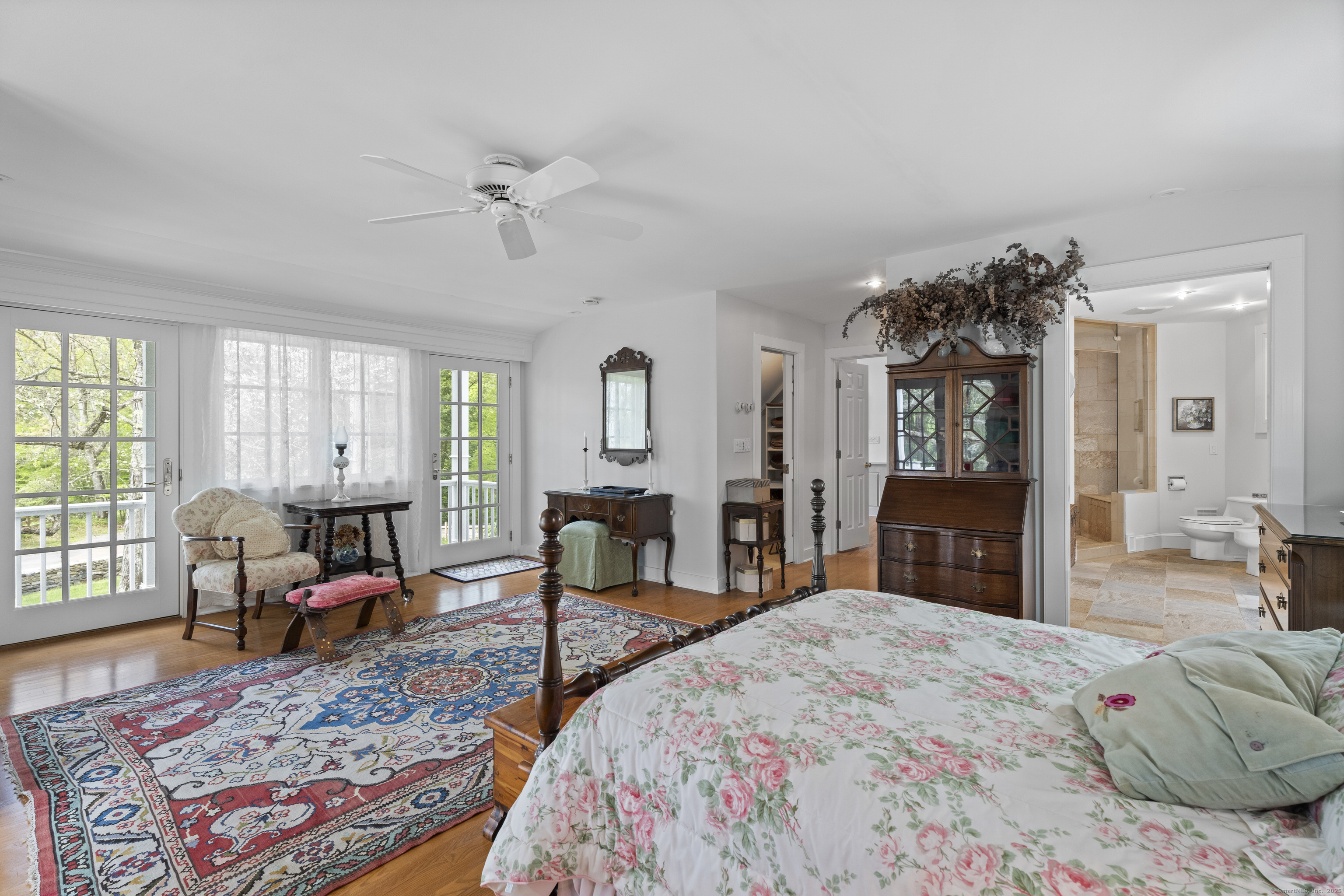 38 Three Bridges Road East Haddam, CT 06423 - Photo 15 of 39 a living room with furniture a chandelier and a dresser