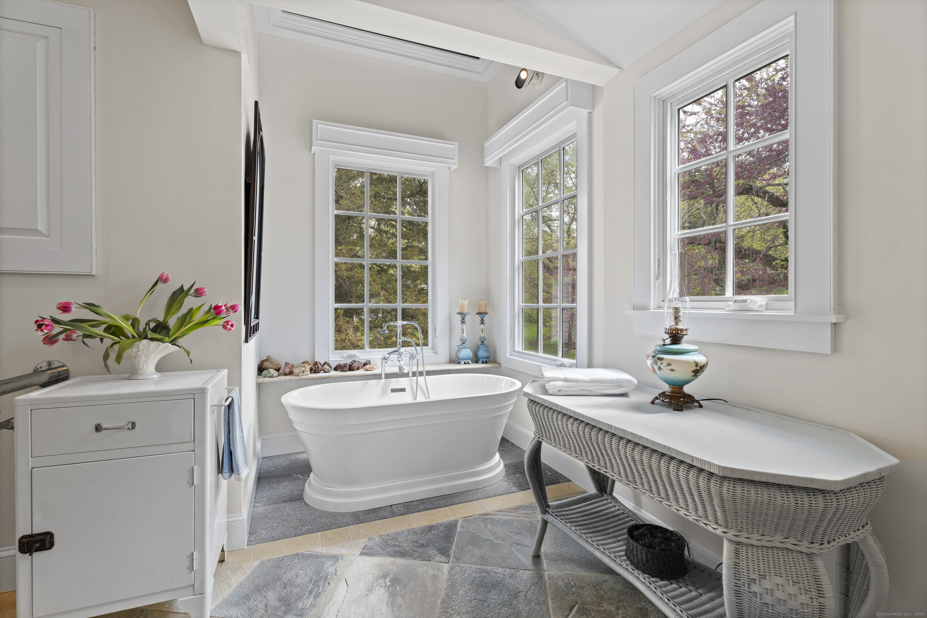 38 Three Bridges Road East Haddam, CT 06423 - Photo 17 of 39 a bathroom with a tub sink and mirror