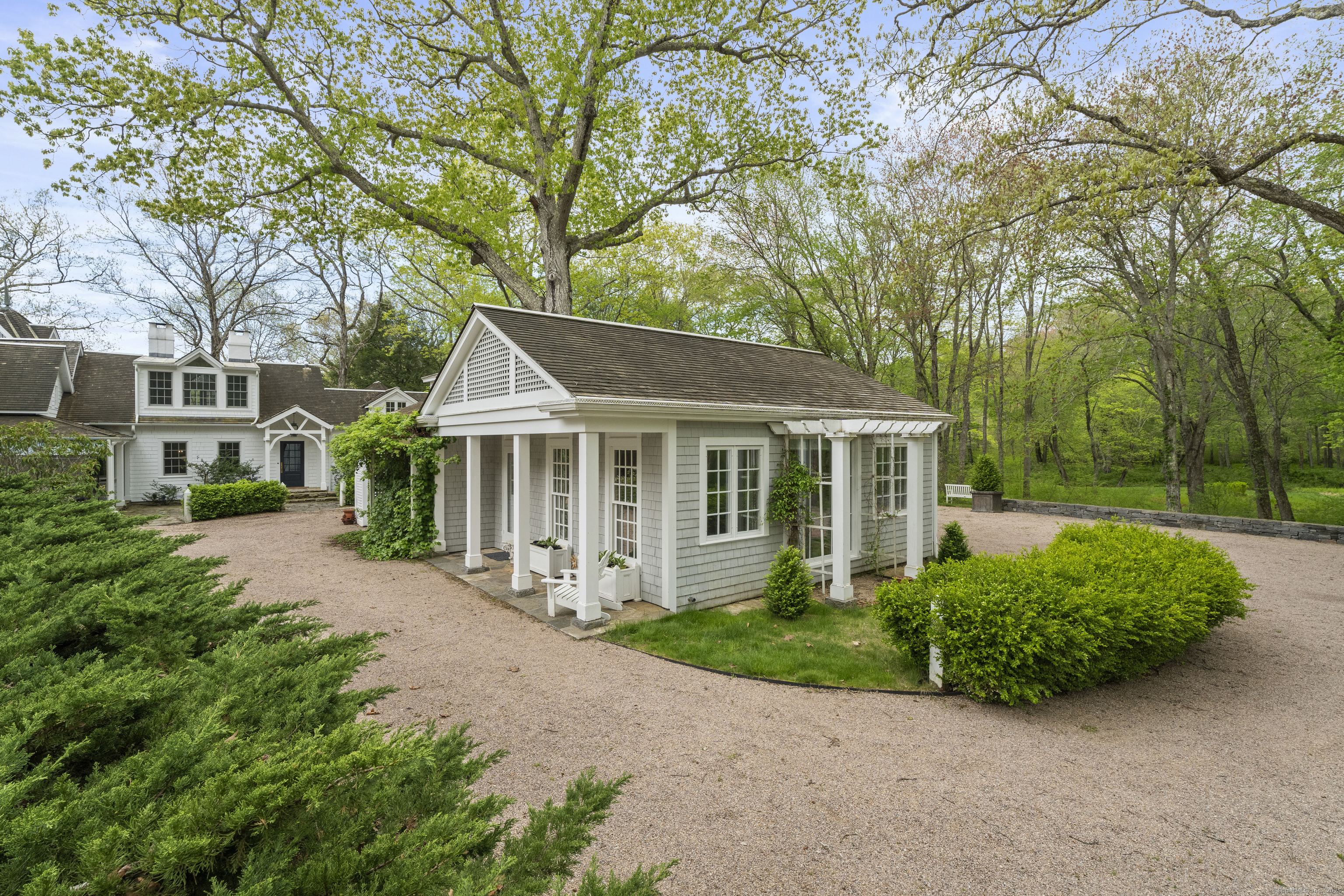 38 Three Bridges Road East Haddam, CT 06423 - Photo 23 of 39 a front view of a house with a garden and trees