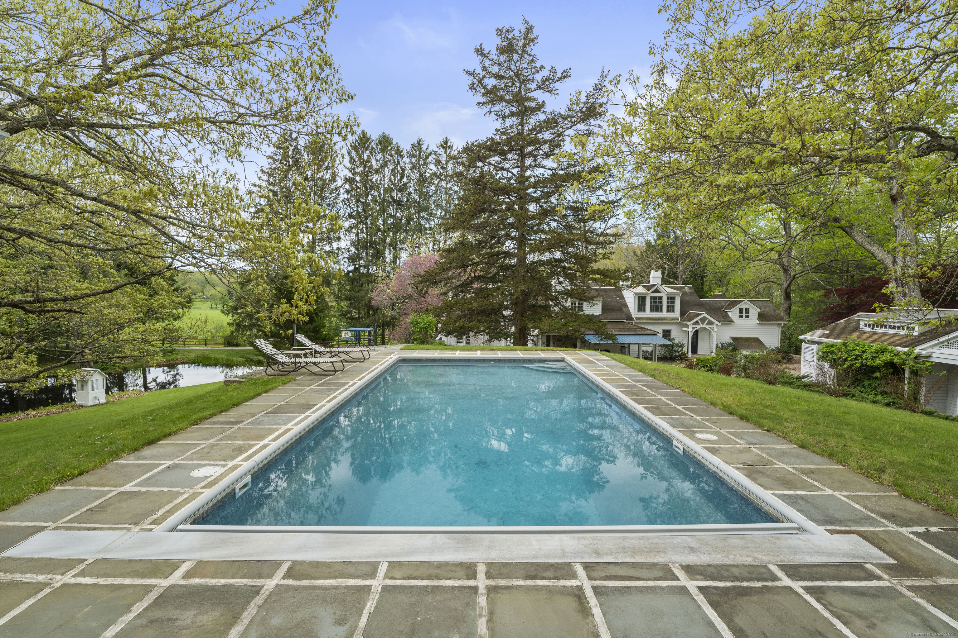 38 Three Bridges Road East Haddam, CT 06423 - Photo 26 of 39 a view of a swimming pool and a yard