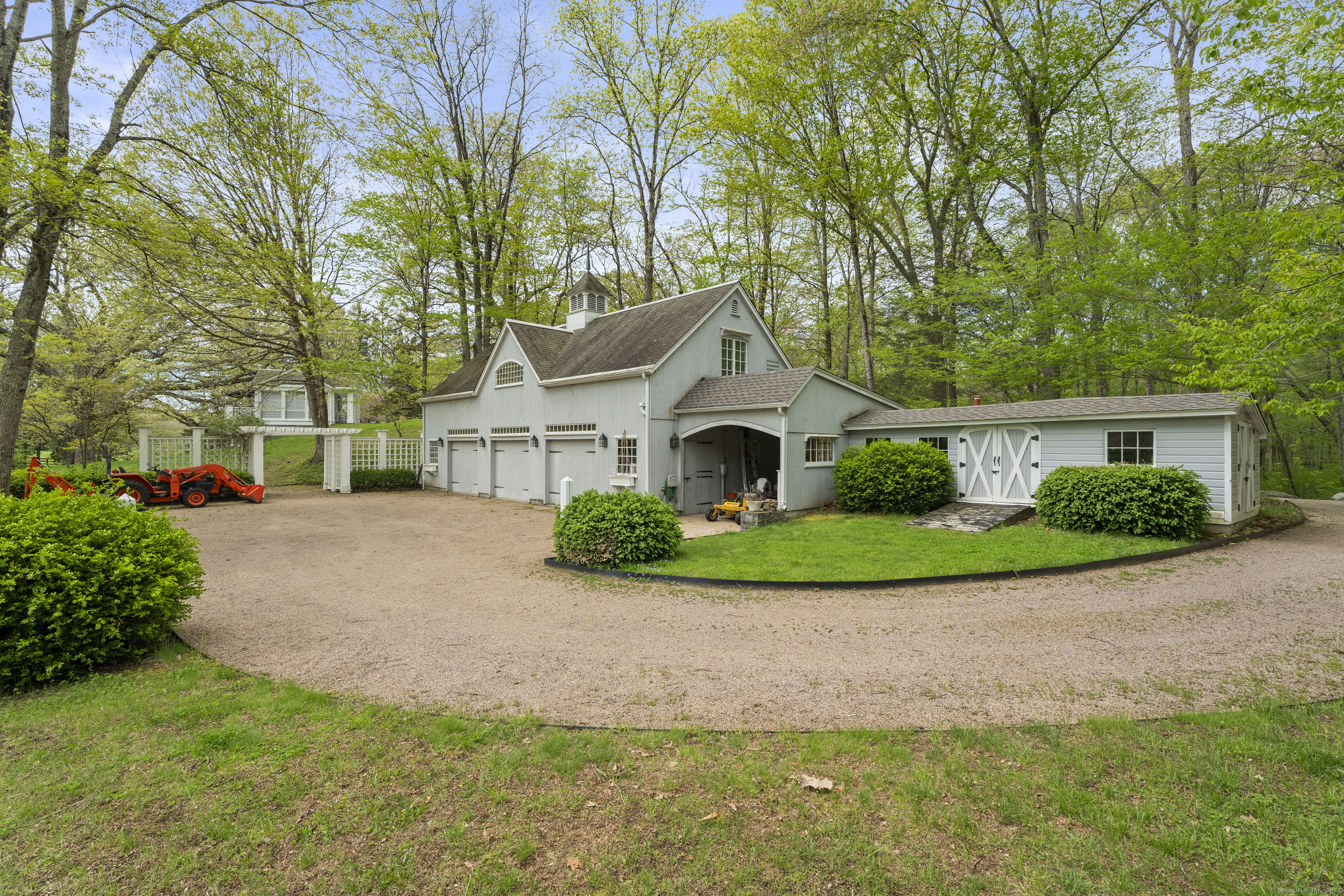 38 Three Bridges Road East Haddam, CT 06423 - Photo 30 of 39 a front view of a house with a yard and garage
