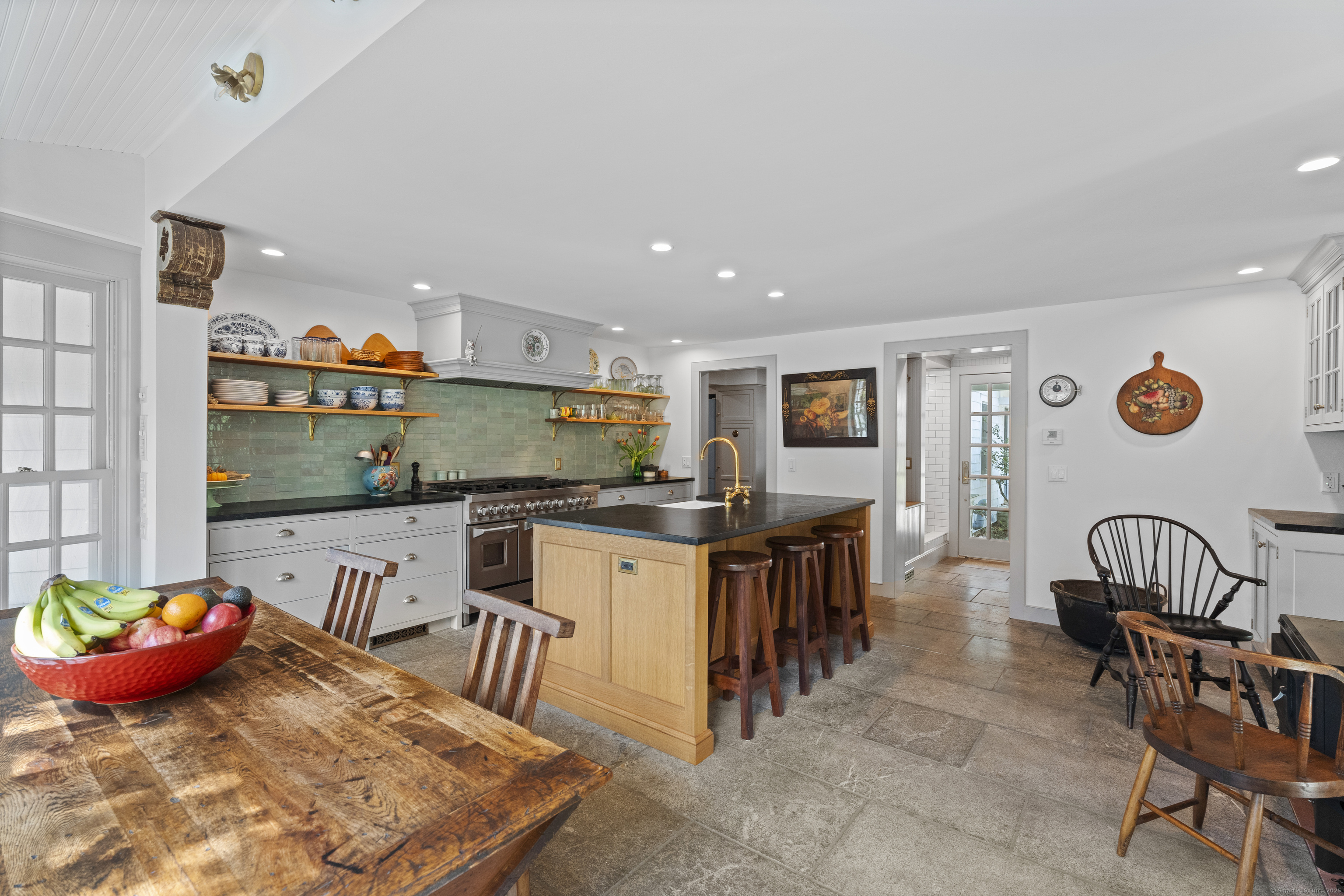 38 Three Bridges Road East Haddam, CT 06423 - Photo 6 of 39 a kitchen with stainless steel appliances granite countertop a sink and a refrigerator