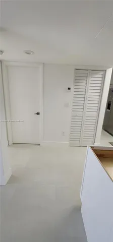 a bathroom with a bathtub and toilet