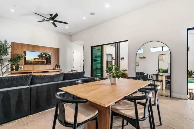 a view of a dining room with furniture and a livingroom