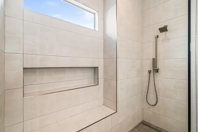 a bathroom with a glass shower