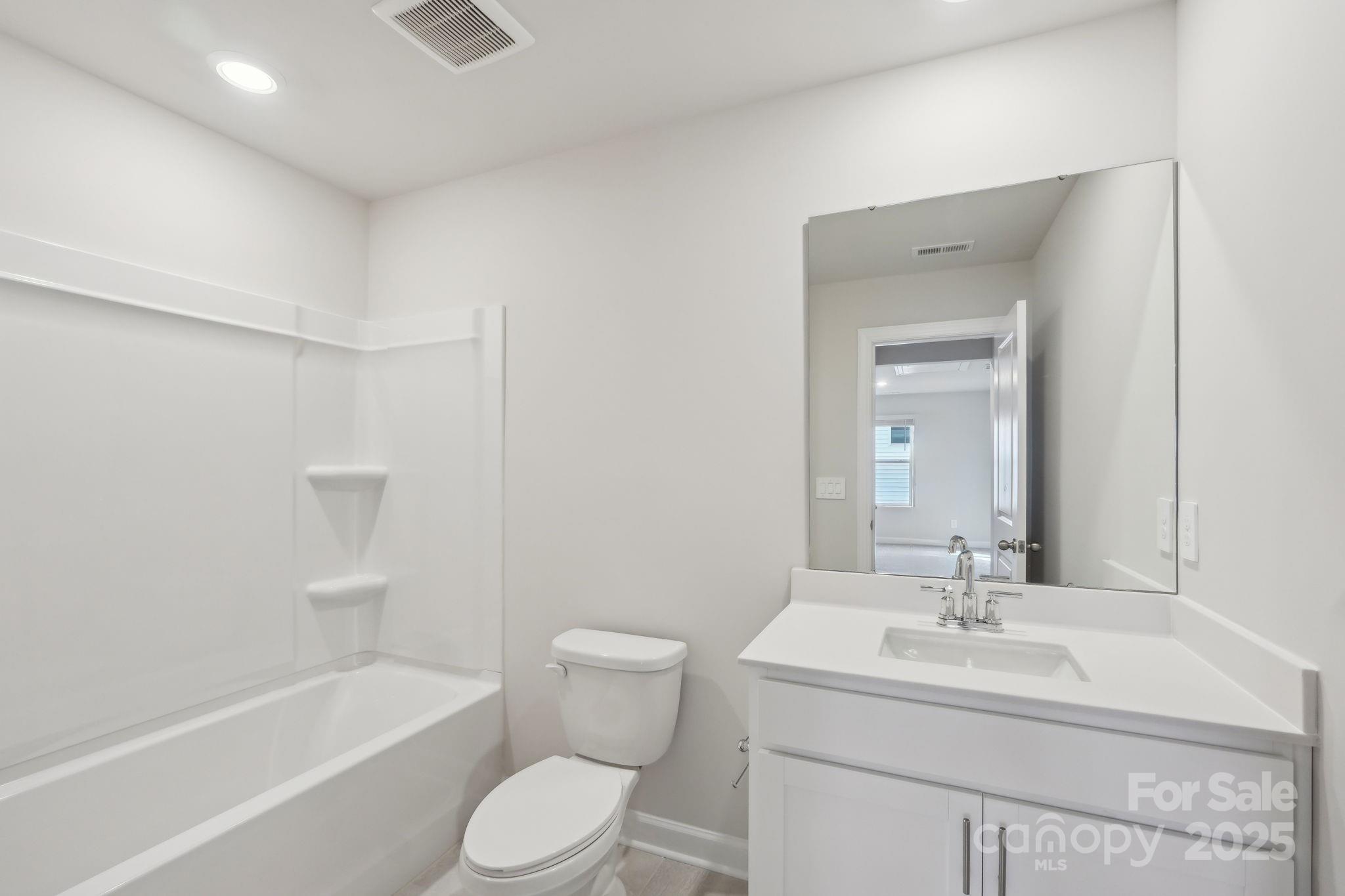 1321 30th St Lane Northeast Conover, NC 28613 - Photo 23 of 27 a bathroom with a sink toilet and shower