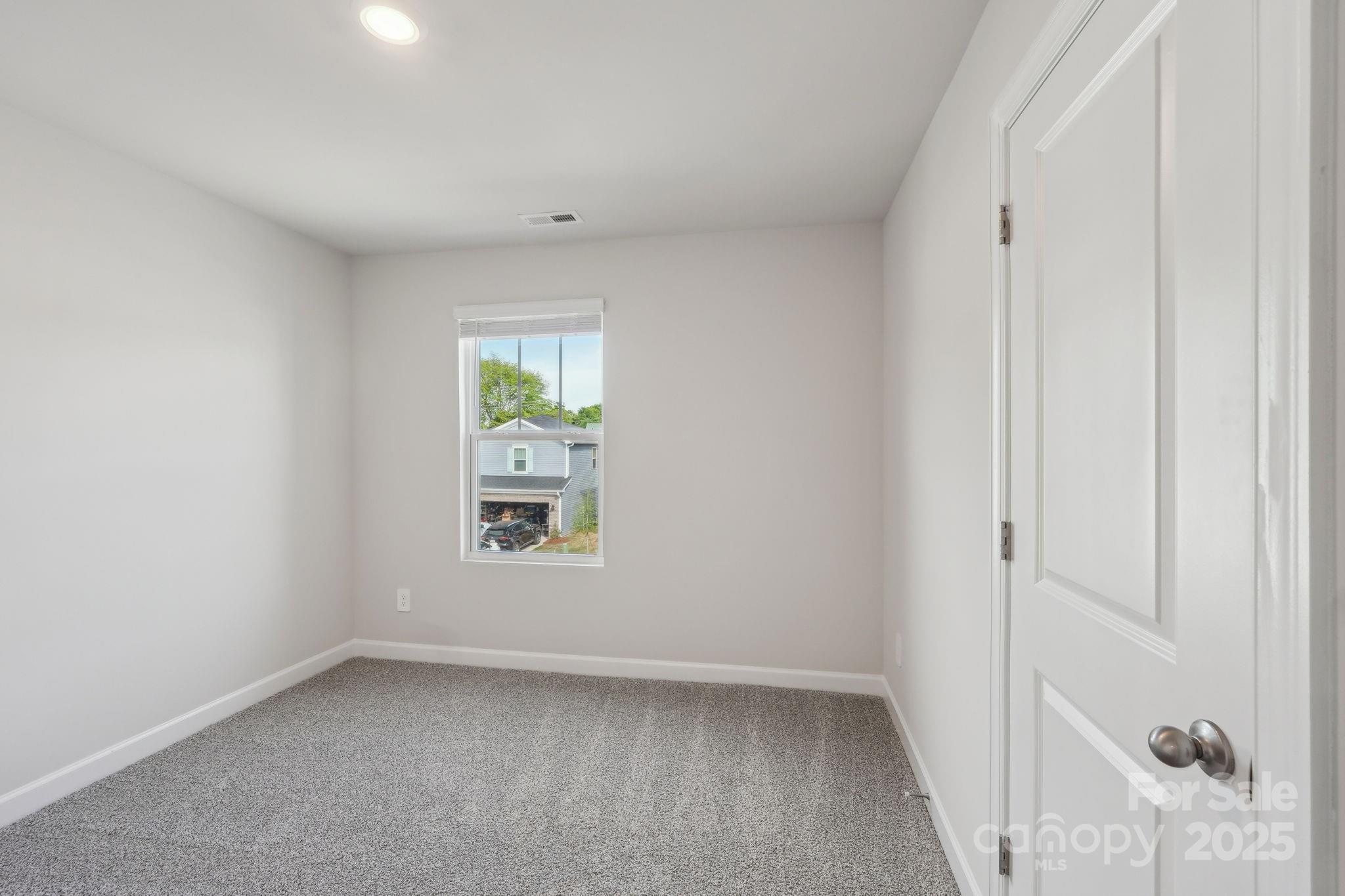 1321 30th St Lane Northeast Conover, NC 28613 - Photo 24 of 27 a view of an empty room with a window