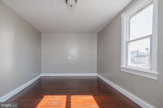 a view of livingroom with hardwood floor and window