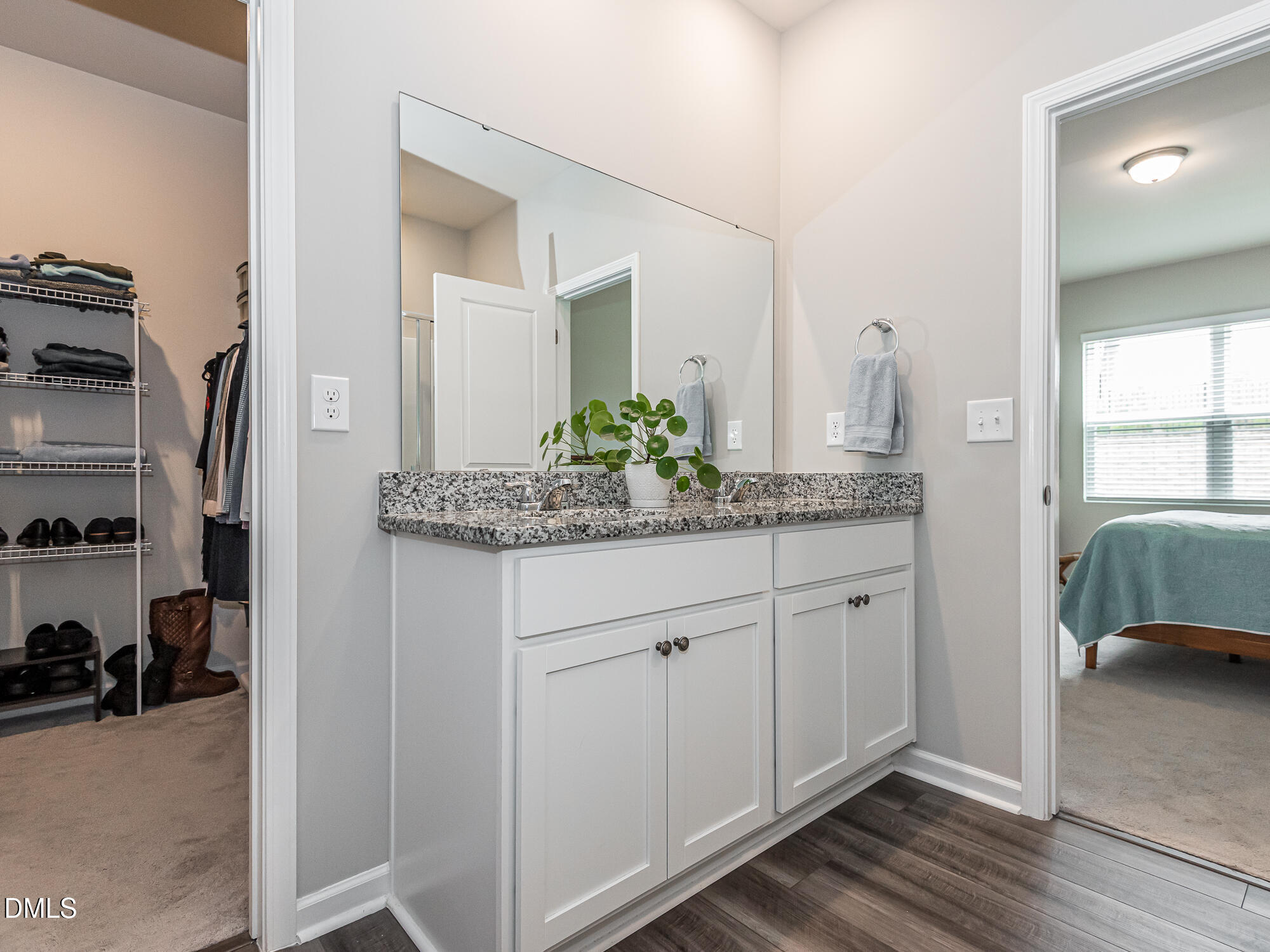 1644 Arapahoe Ridge Drive Raleigh, NC 27604 - Photo 20 of 41 a en suite bathroom with a sink and a mirror