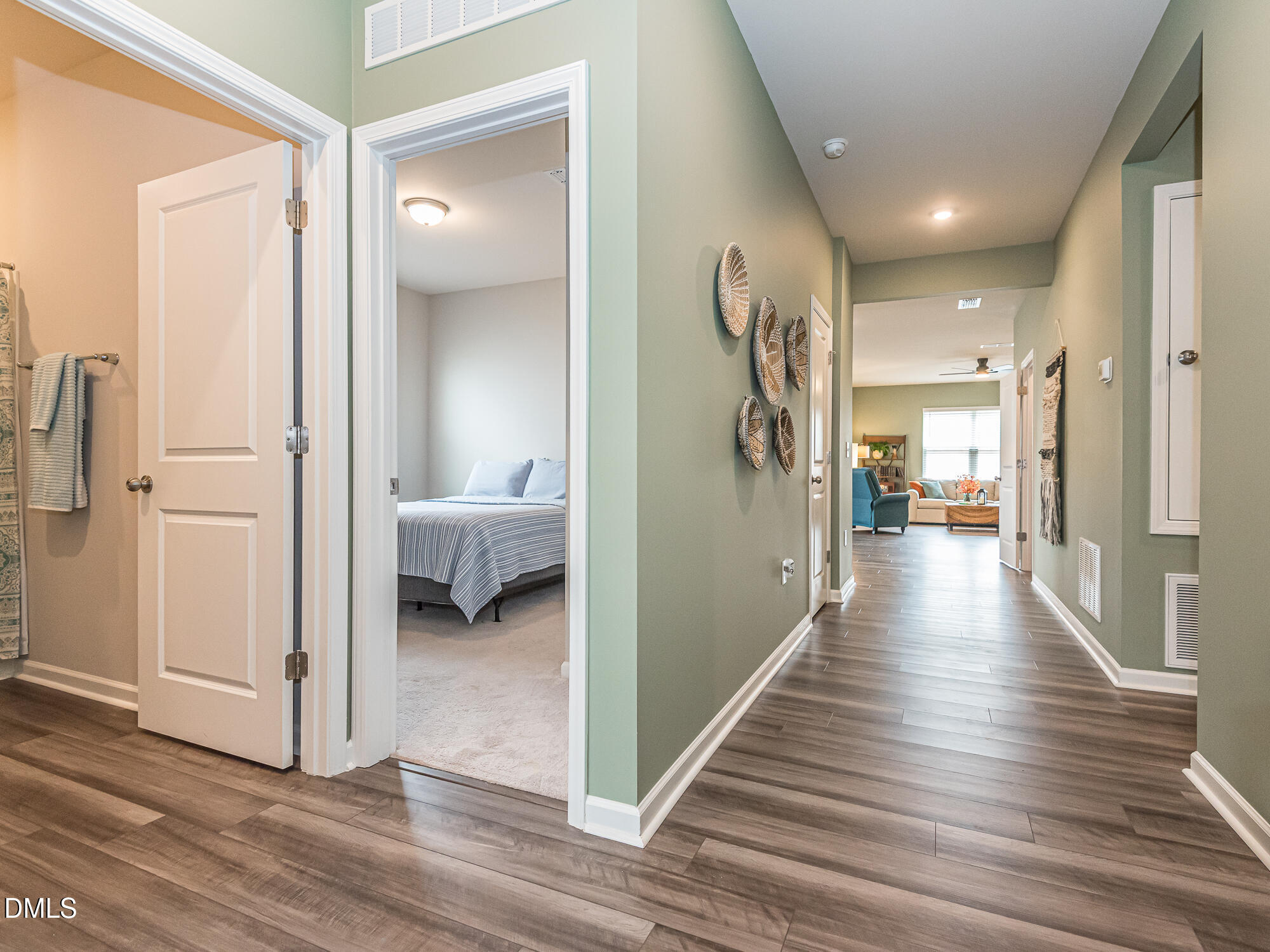 1644 Arapahoe Ridge Drive Raleigh, NC 27604 - Photo 23 of 41 a view of a hallway view with wooden floor and staircase