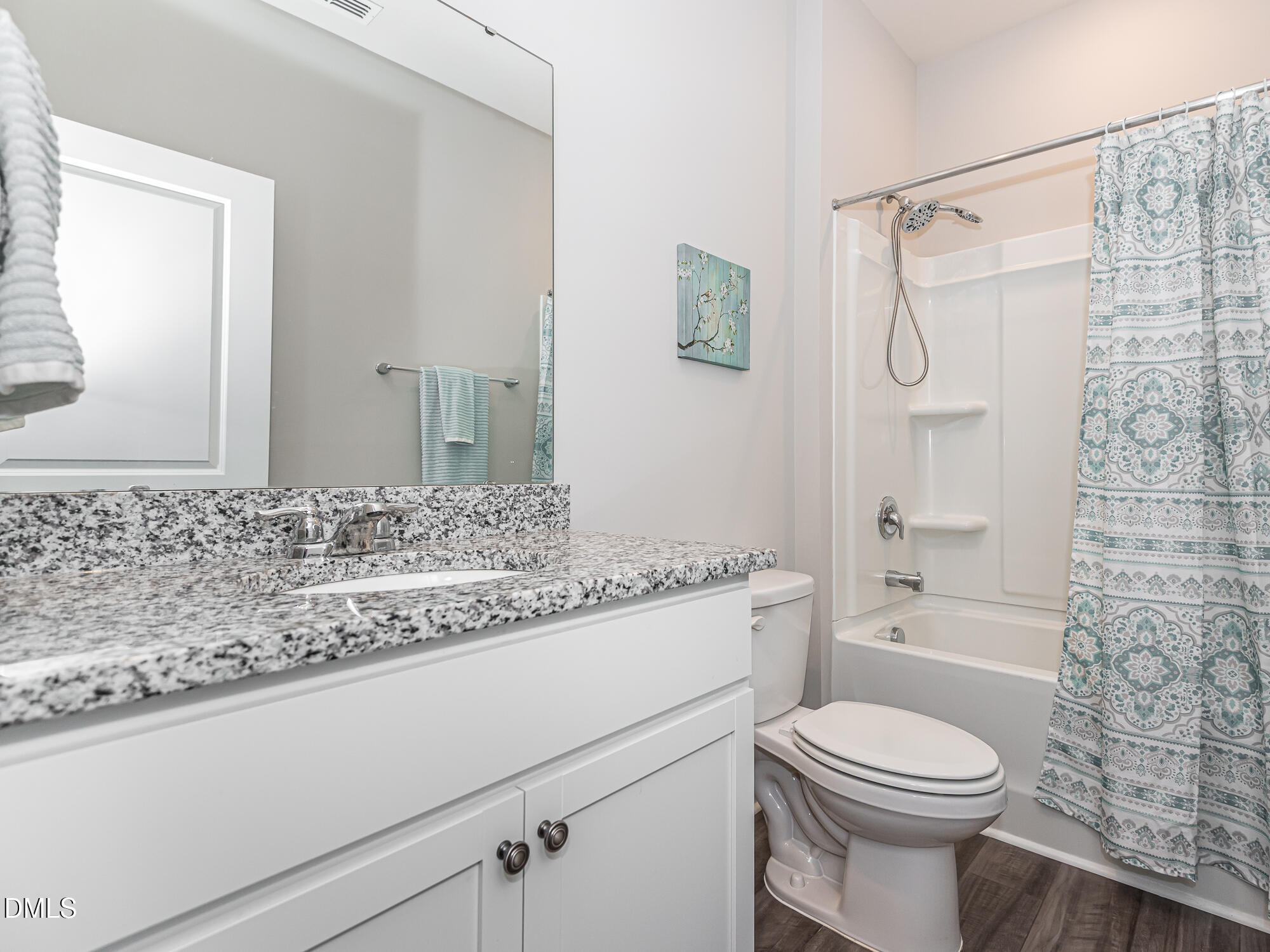 1644 Arapahoe Ridge Drive Raleigh, NC 27604 - Photo 26 of 41 a bathroom with a granite countertop sink toilet mirror and shower
