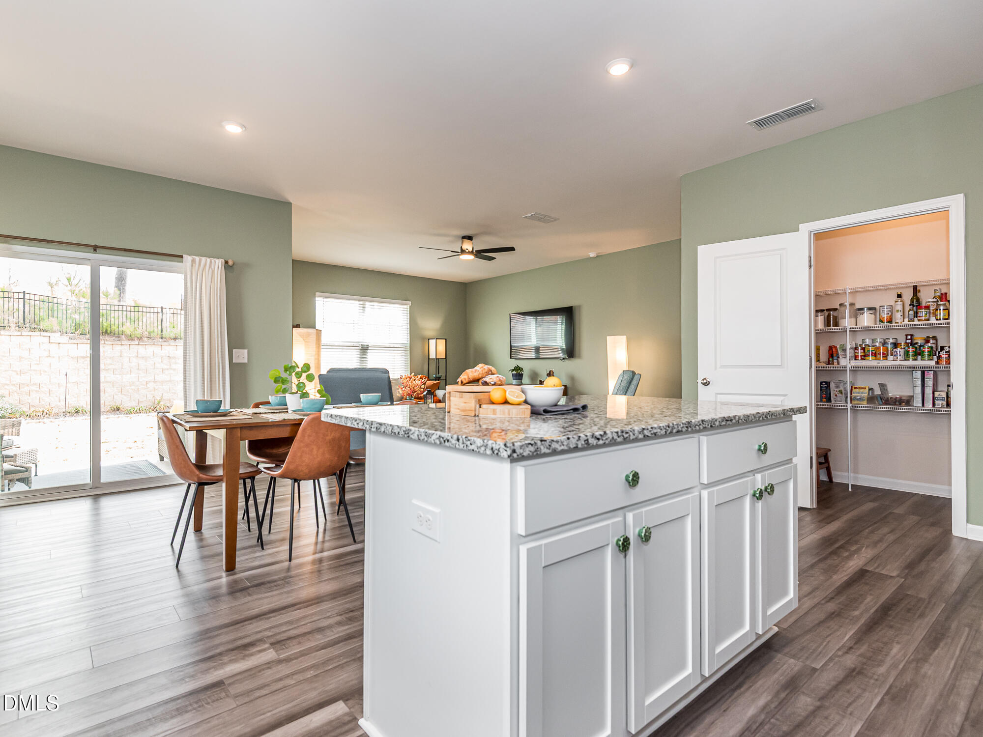 1644 Arapahoe Ridge Drive Raleigh, NC 27604 - Photo 28 of 41 a kitchen with center island and windows