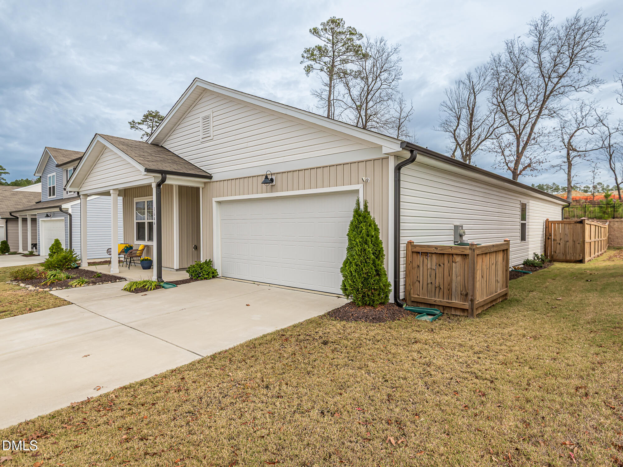1644 Arapahoe Ridge Drive Raleigh, NC 27604 - Photo 34 of 41 a view of a house with a yard and garage