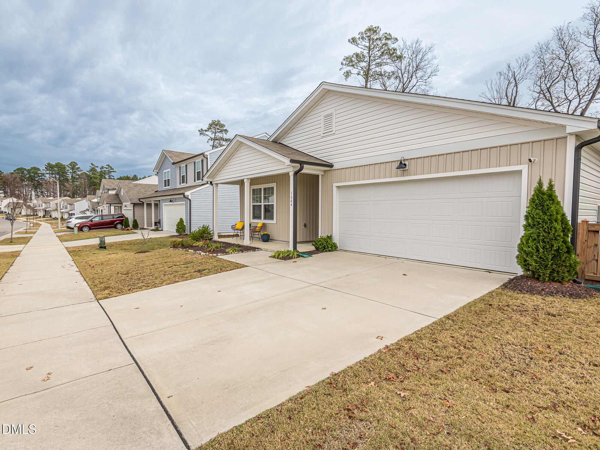 1644 Arapahoe Ridge Drive Raleigh, NC 27604 - Photo 35 of 41 a view of a white house with a outdoor space
