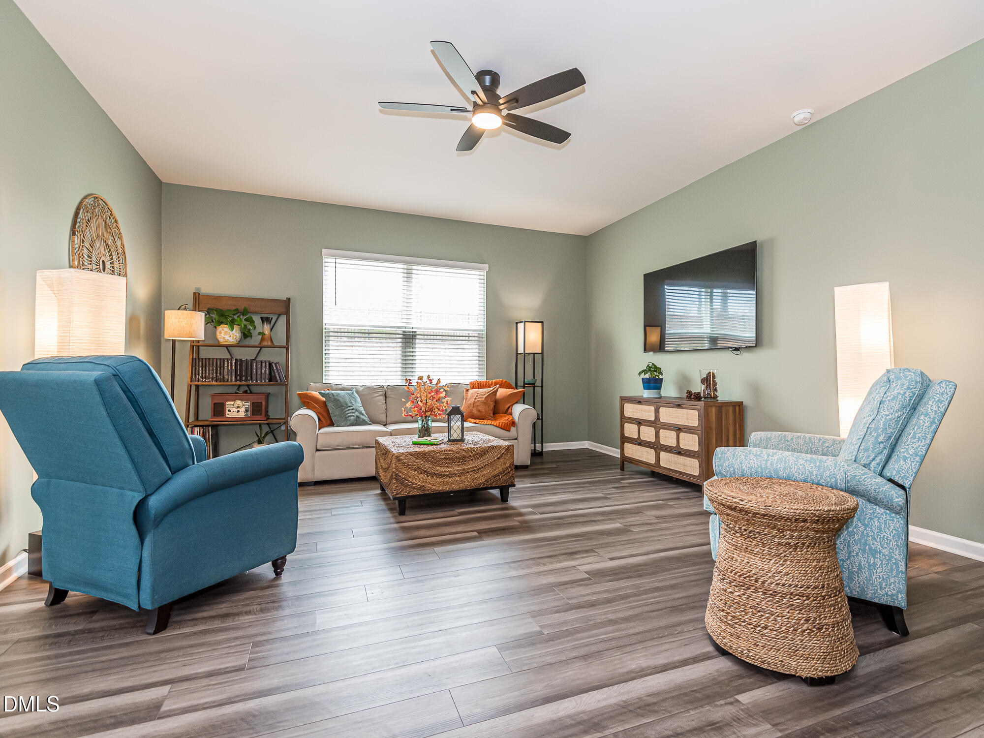 1644 Arapahoe Ridge Drive Raleigh, NC 27604 - Photo 6 of 41 a living room with furniture or couch and a wooden floor