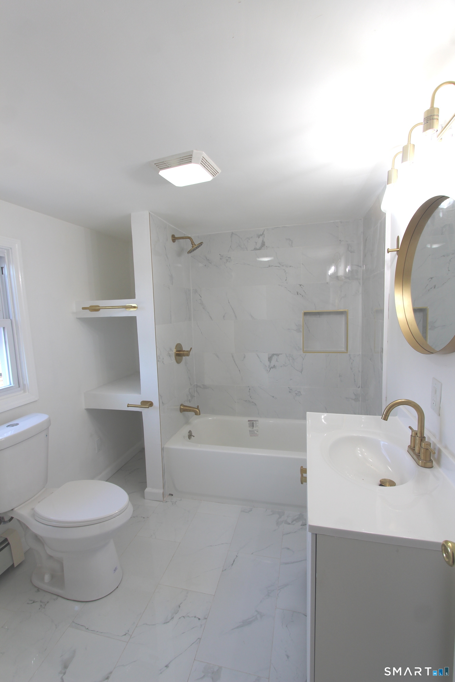 52 Glen Haven Road New Haven, CT 06513 - Photo 13 of 15 a bathroom with a sink a toilet and bathtub
