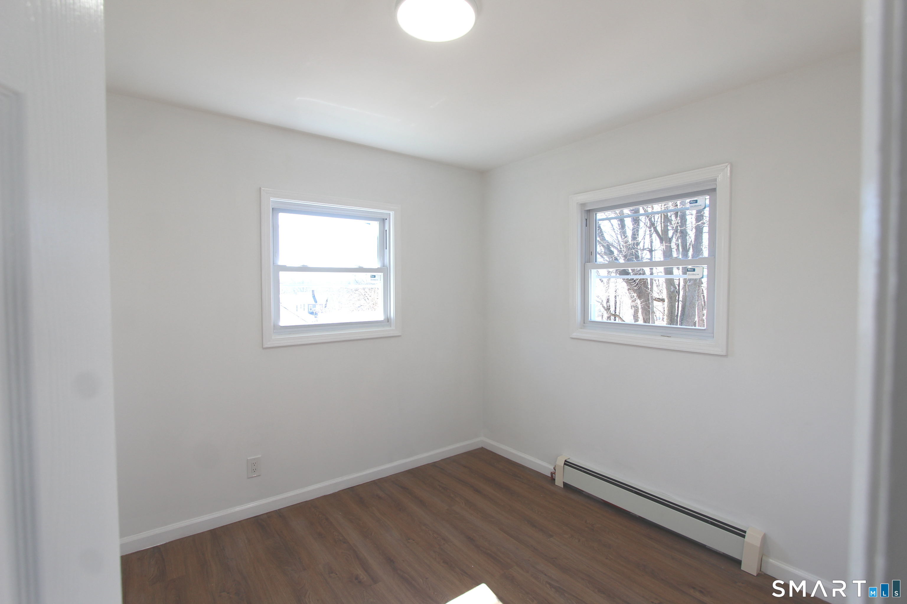 52 Glen Haven Road New Haven, CT 06513 - Photo 8 of 15 an empty room with a window