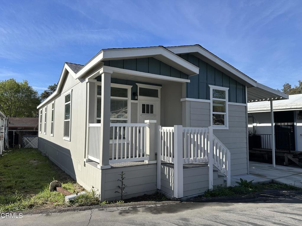 1273 South Rice Road, Unit 37 Ojai, CA 93023 - Photo 1 of 1 a front view of a house with a yard
