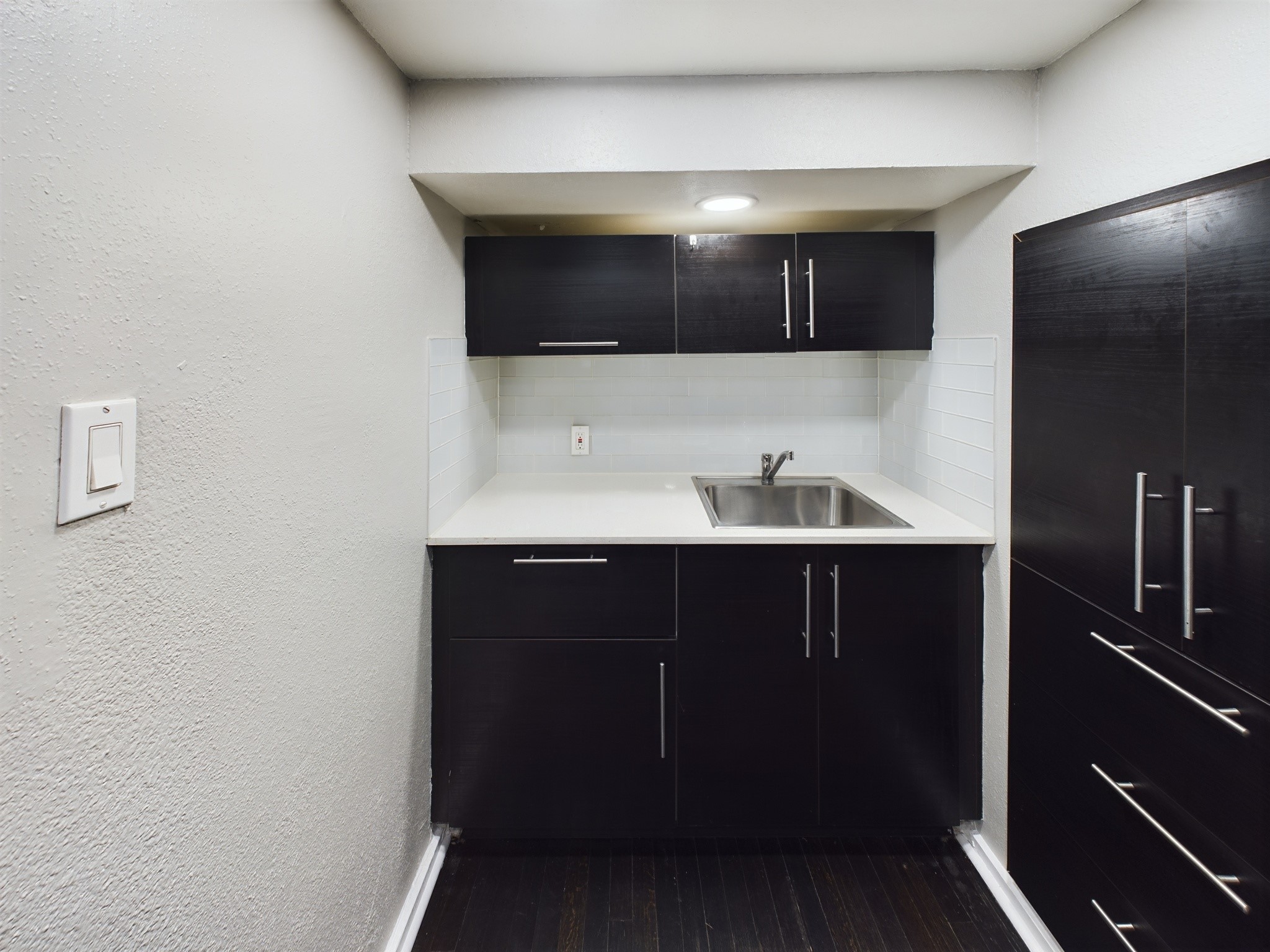 605 Enid 1/2 2 Street Houston, TX 77009 - Photo 2 of 7 a bathroom with a sink and a mirror