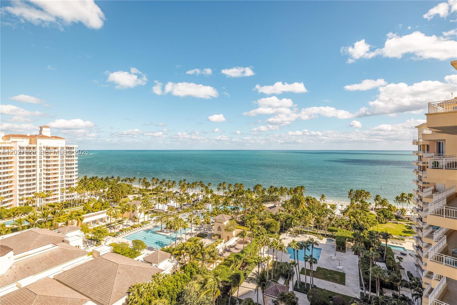 799 Crandon Boulevard, Unit PH8 Key Biscayne, FL 33149 - Photo 1 of 47 a view of a lake with a city