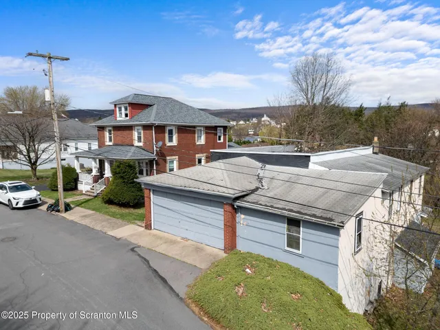 a view of a house with a big yard