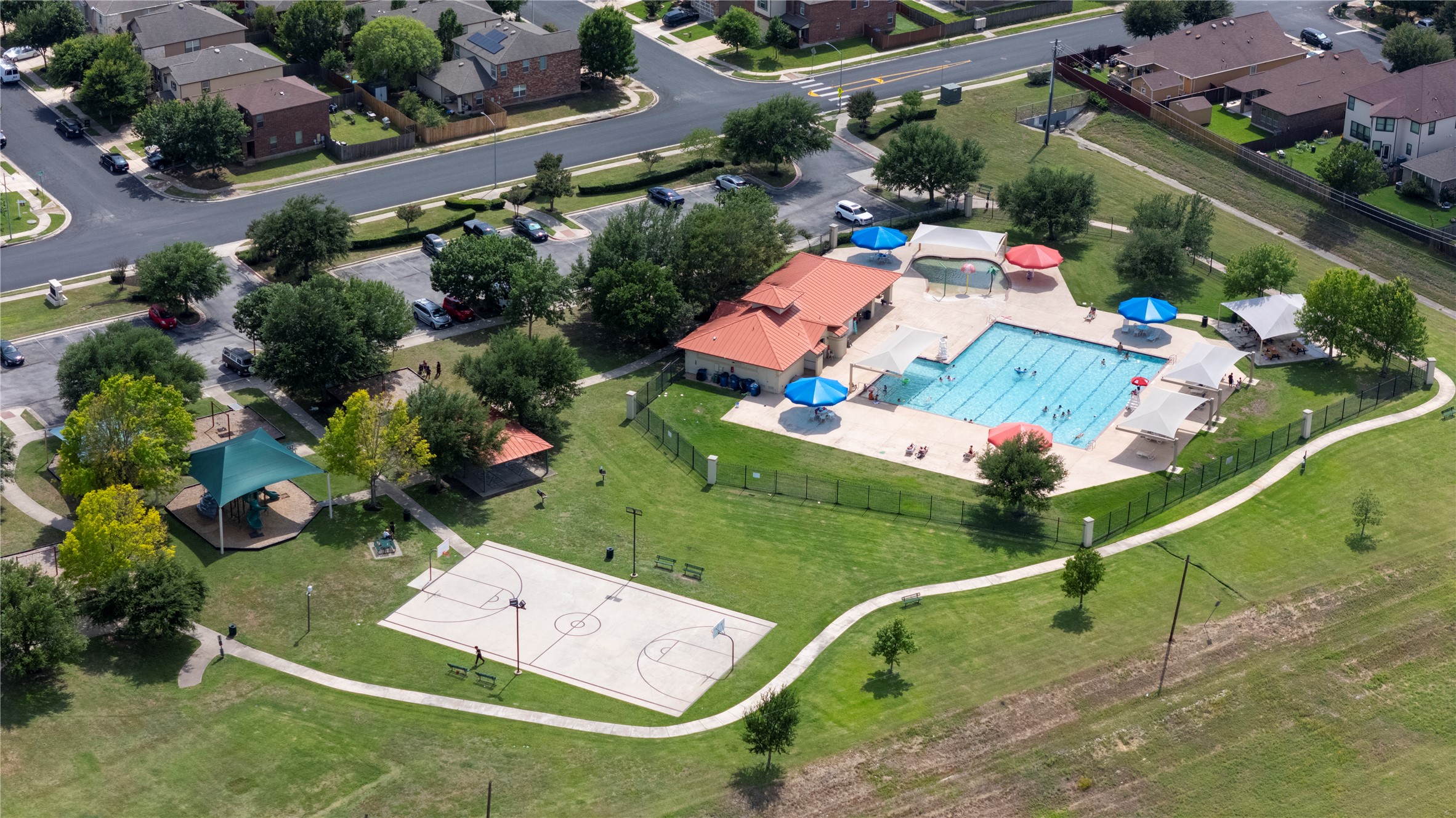 8613 Capitol View Drive Austin, TX 78747 - Photo 33 of 33 Vibrant community amenities, including a swimming pool, basketball court, and playground.