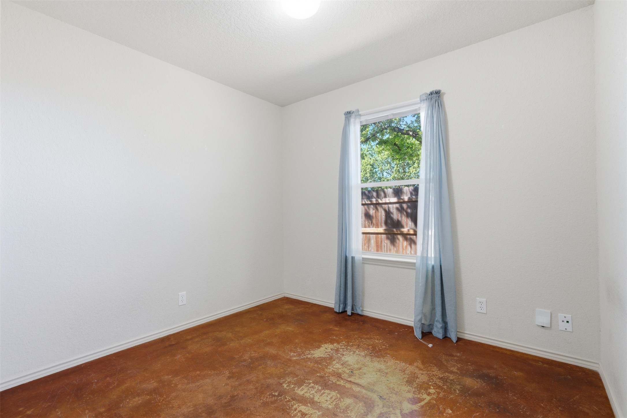 4529 Secure Lane, Unit 31 Austin, TX 78725 - Photo 21 of 38 an empty room with windows