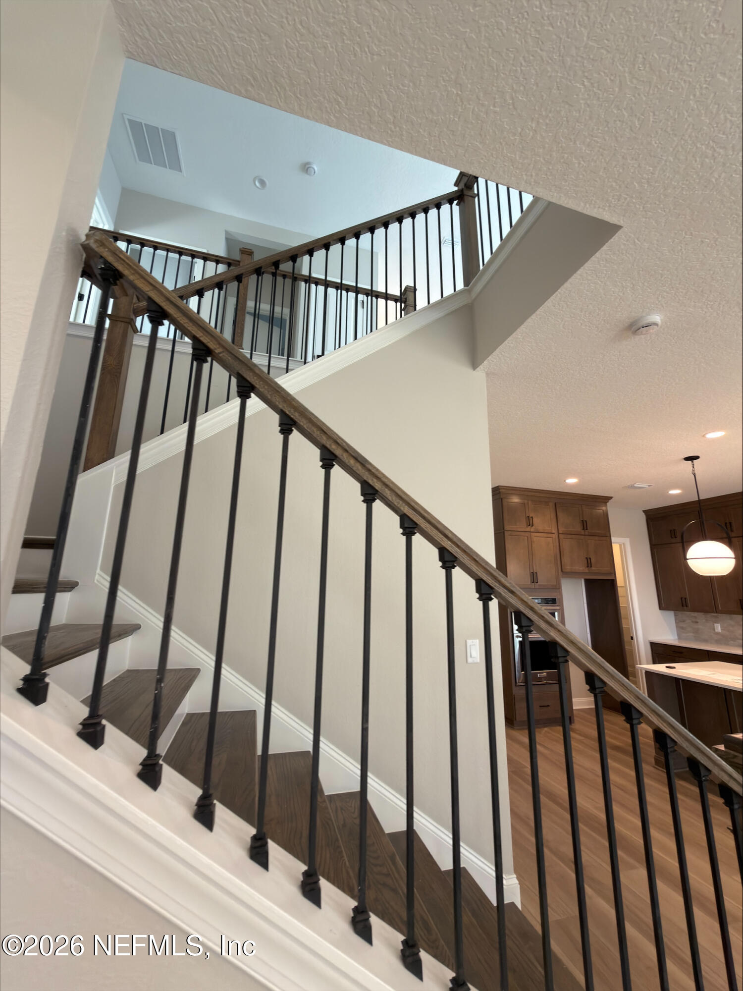 62 Slip Cove St. Johns, FL 32259 - Photo 12 of 54 a view of staircase with railing and white walls