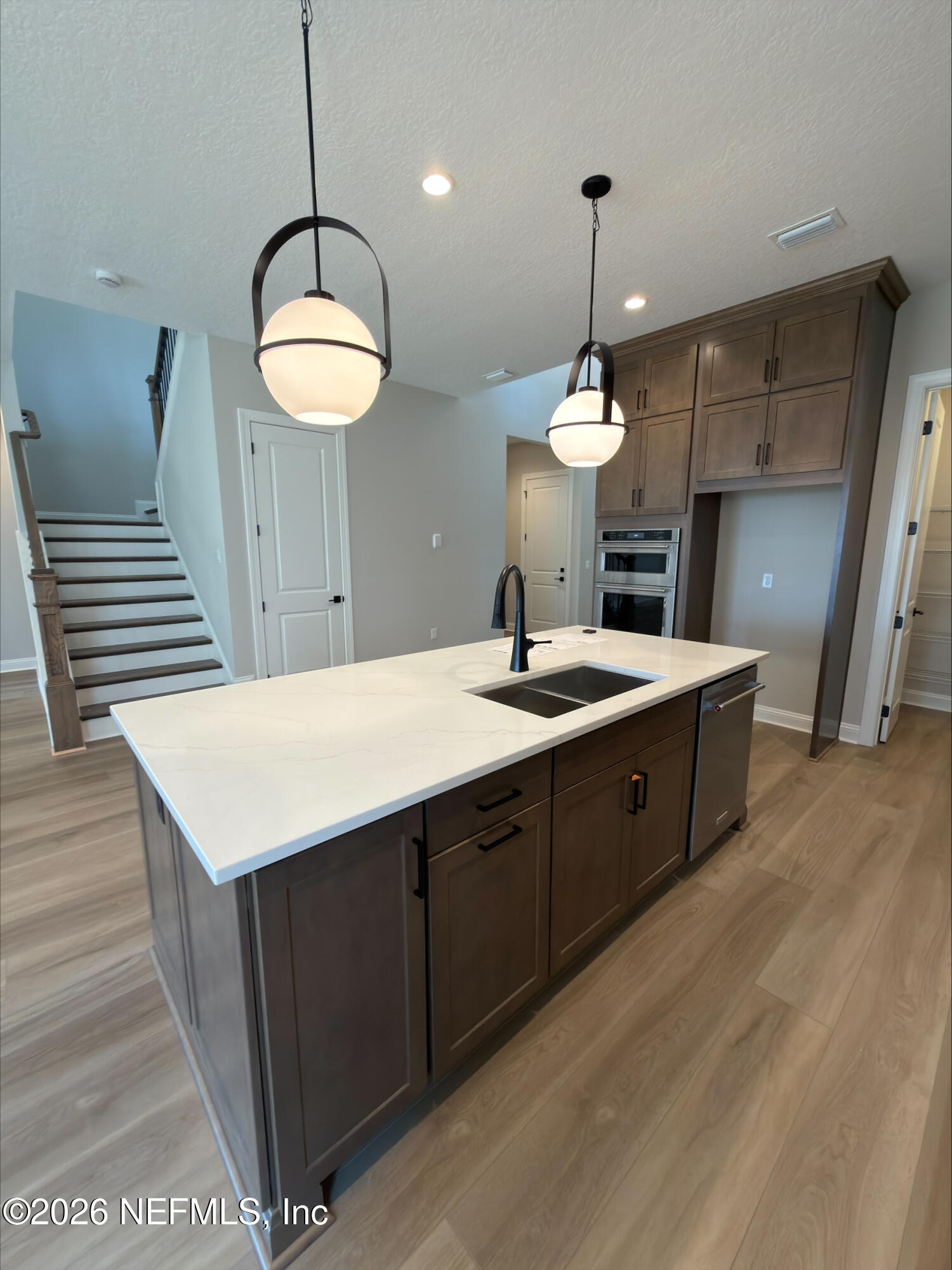 62 Slip Cove St. Johns, FL 32259 - Photo 17 of 54 a kitchen with a refrigerator a sink and dishwasher
