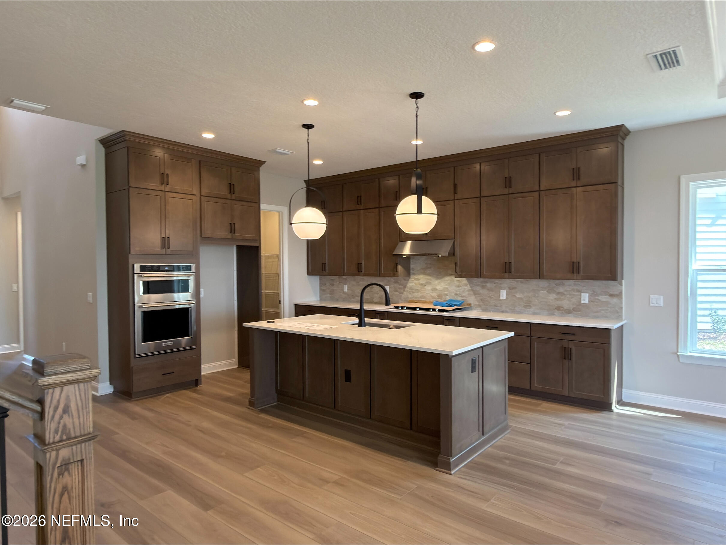 62 Slip Cove St. Johns, FL 32259 - Photo 3 of 54 a large kitchen with stainless steel appliances a large counter top