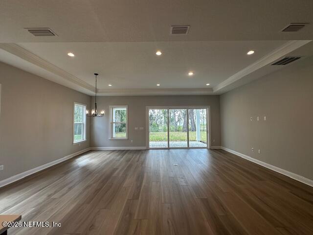 62 Slip Cove St. Johns, FL 32259 - Photo 41 of 54 a view of an empty room with wooden floor and a window