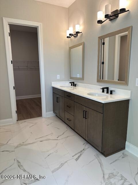 62 Slip Cove St. Johns, FL 32259 - Photo 42 of 54 a bathroom with a sink and a mirror