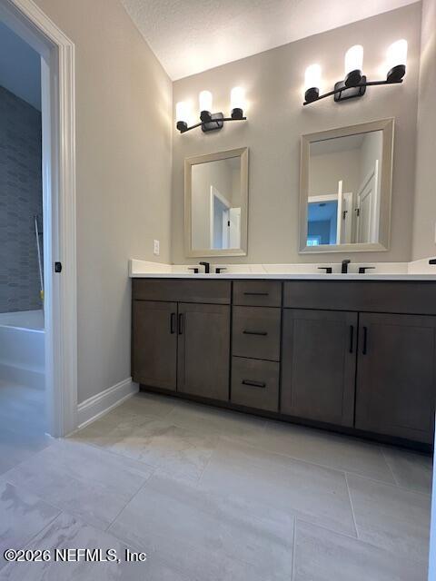 62 Slip Cove St. Johns, FL 32259 - Photo 50 of 54 a bathroom with a sink double vanity and a mirror