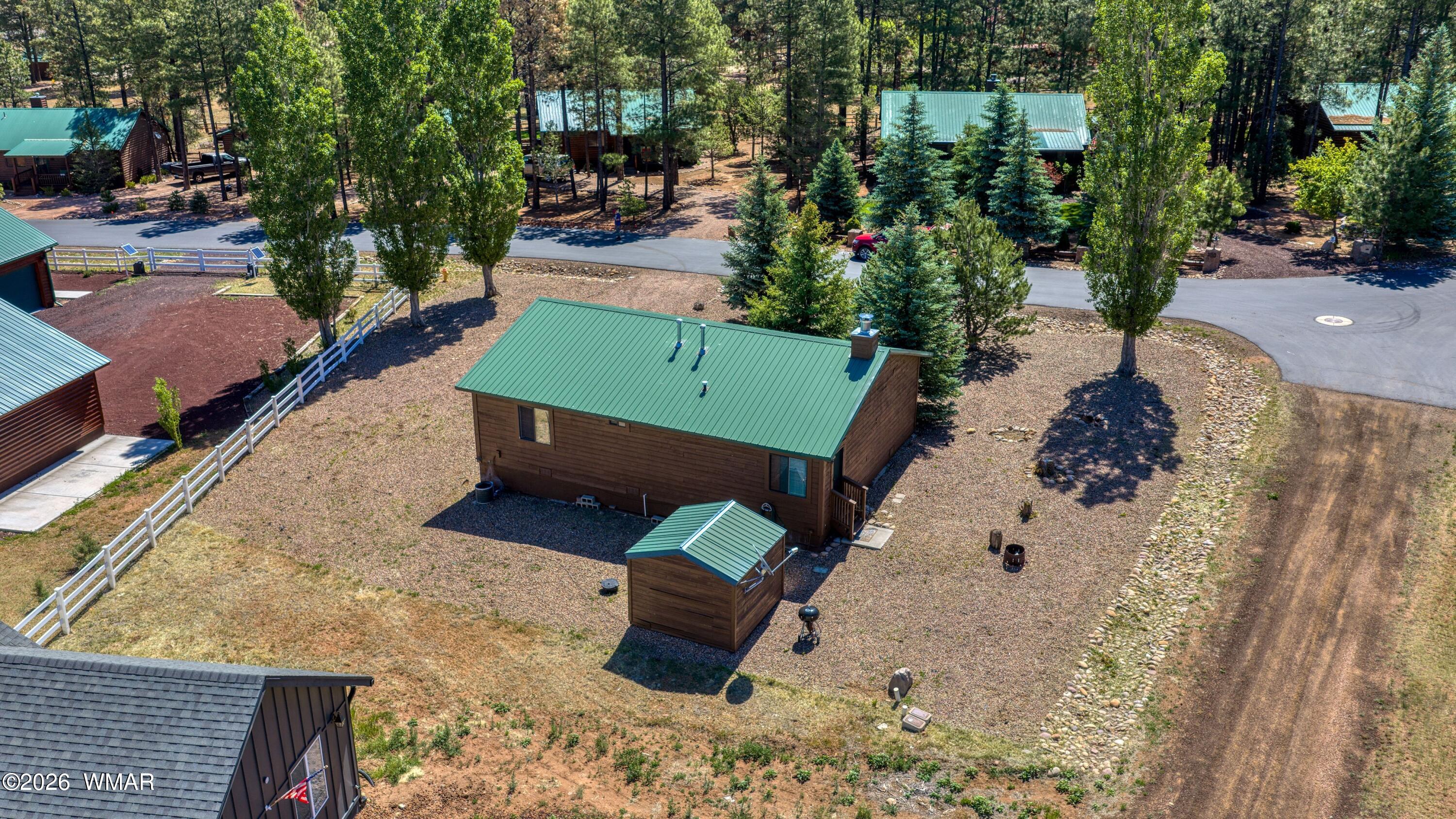 2722 Bain Trail Overgaard, AZ 85933 - Photo 25 of 28 an aerial view of a house with a yard