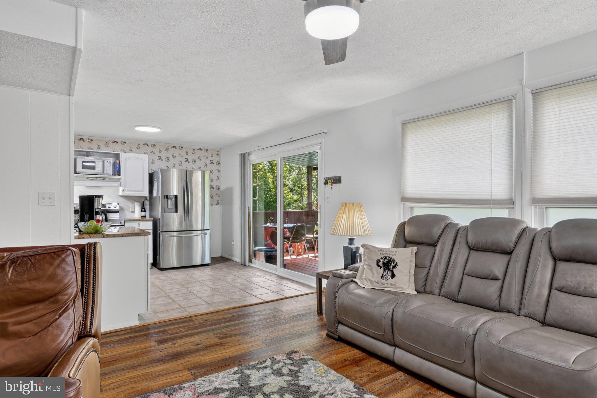 274 The Hill Road, Unit 13A Basye, VA 22810 - Photo 6 of 12 Bright and inviting open space.