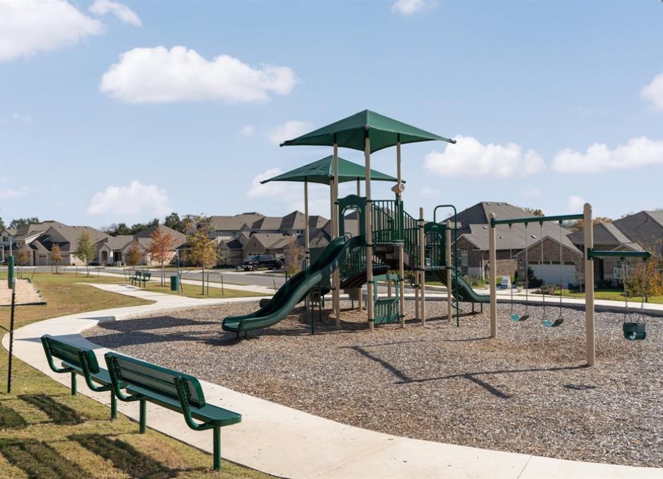 401 Peace Pipe Way Georgetown, TX 78628 - Photo 35 of 37 playground and swings
