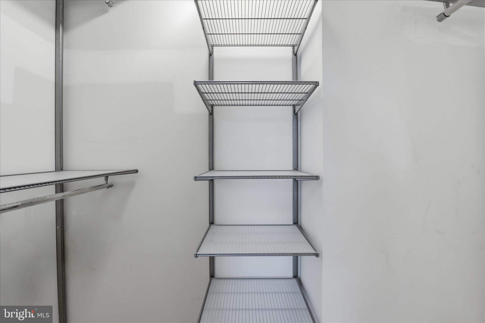 11990 Market Street, Unit 216 Reston, VA 20190 - Photo 34 of 41 a hallway with closet
