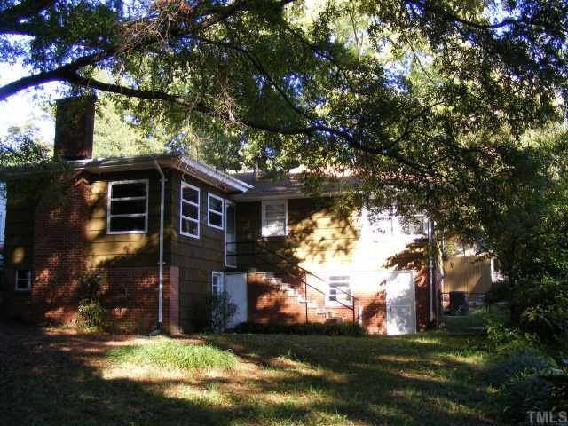 2105 Ruffin Street Durham, NC 27704 - Photo 6 of 7 Basement has two sections. One for storage or workshop, the other for mechanicals. Exterior Back