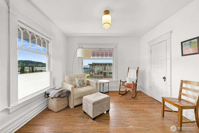 a living room with furniture and a window
