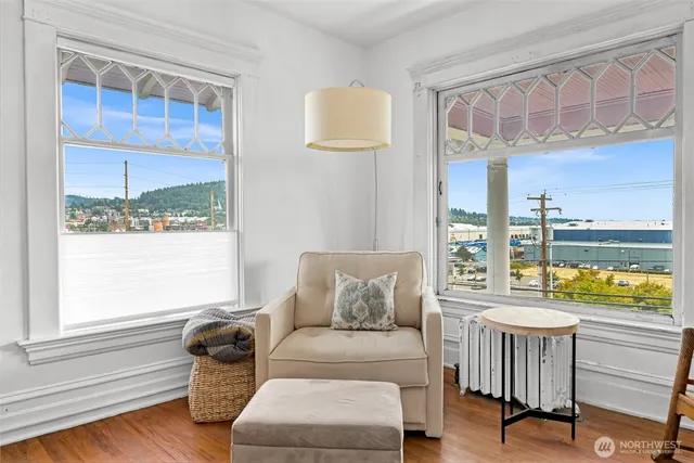a living room with furniture and a window