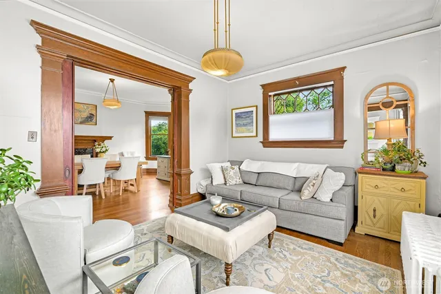 a living room with furniture and a table