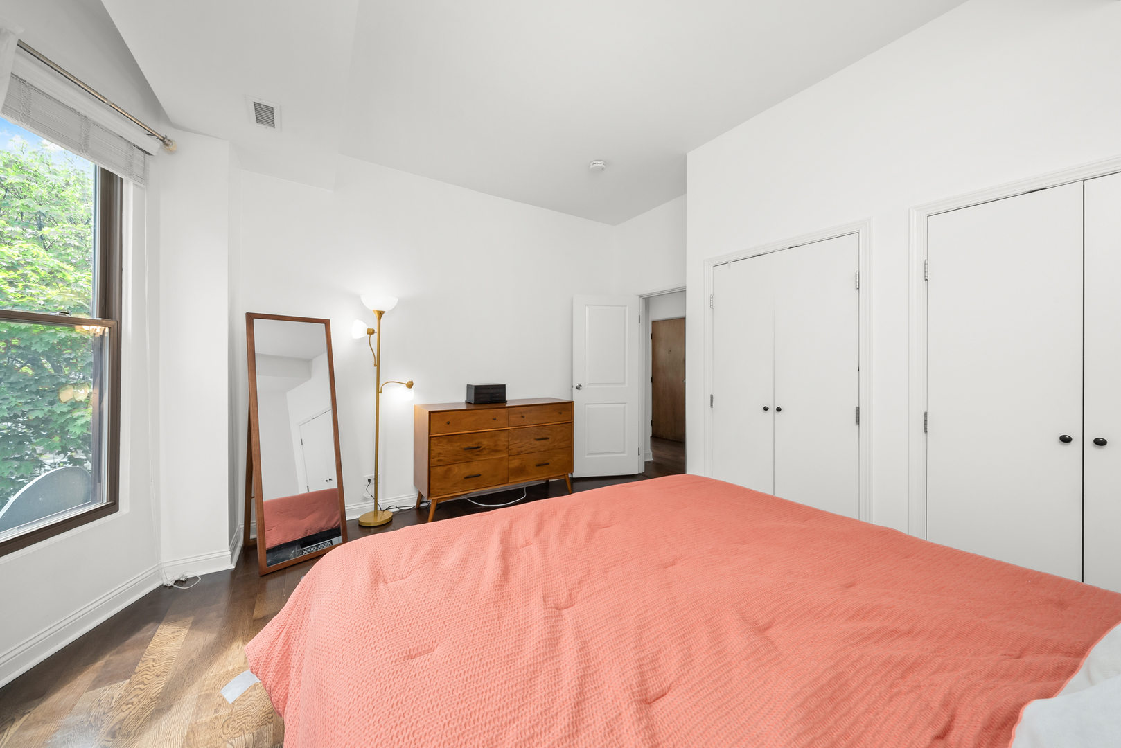 3055 North Seminary Avenue, Unit 3S Chicago, IL 60657 - Photo 13 of 23 a bed room with a bed and a closet
