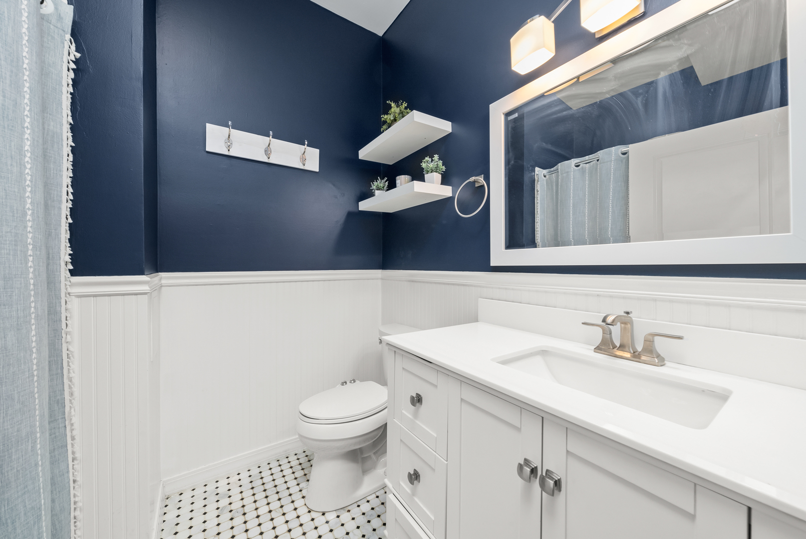 3055 North Seminary Avenue, Unit 3S Chicago, IL 60657 - Photo 14 of 23 a bathroom with a sink a toilet and vanity