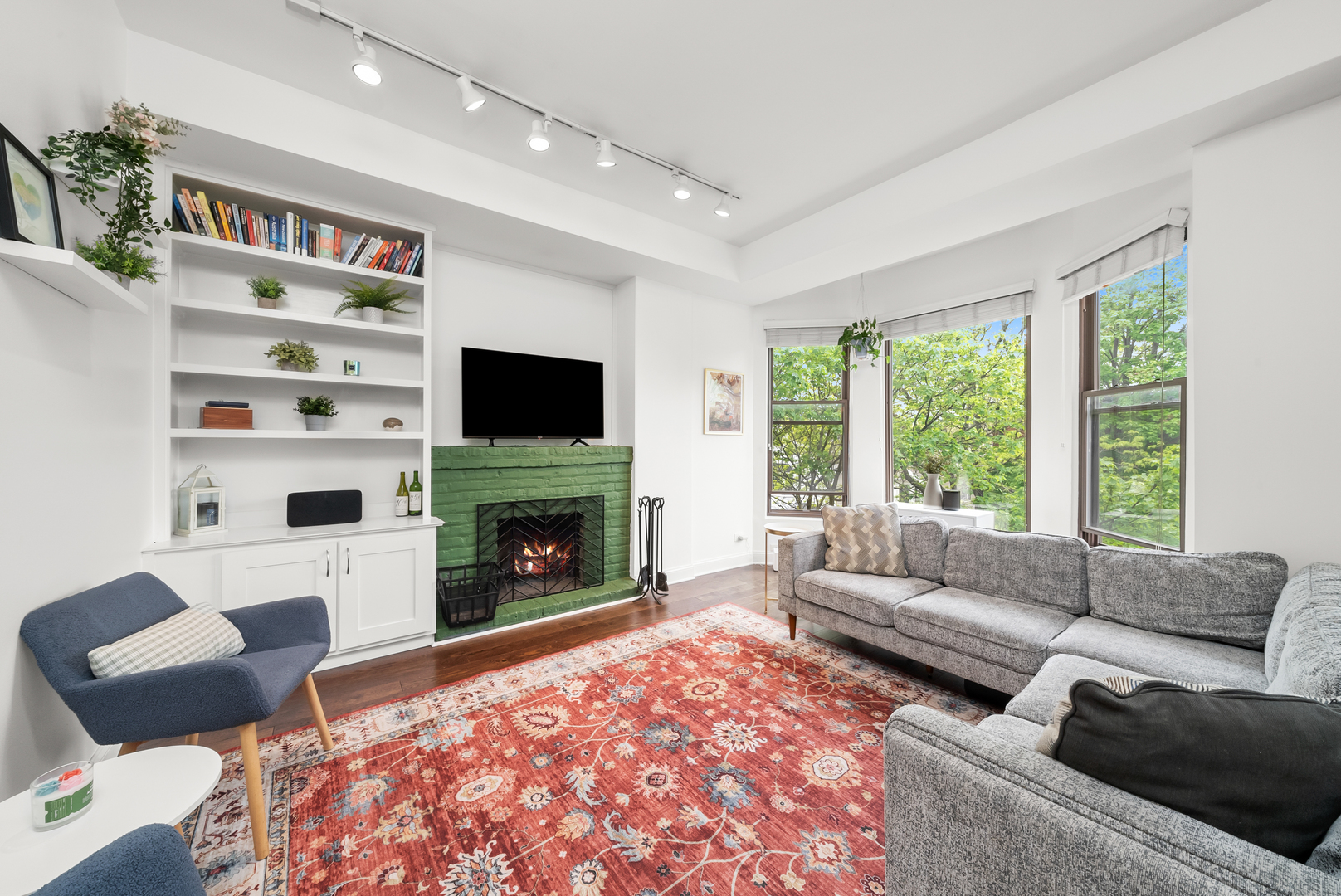 3055 North Seminary Avenue, Unit 3S Chicago, IL 60657 - Photo 2 of 23 a living room with furniture fireplace and window