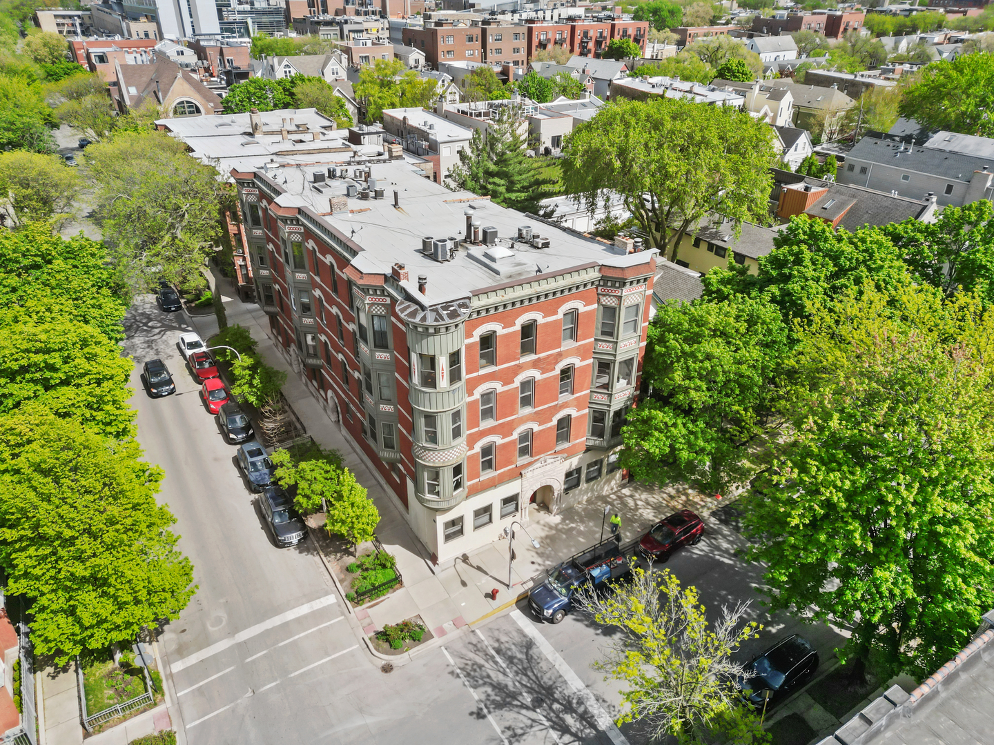 3055 North Seminary Avenue, Unit 3S Chicago, IL 60657 - Photo 21 of 23 an aerial view of a house with a yard and flowers