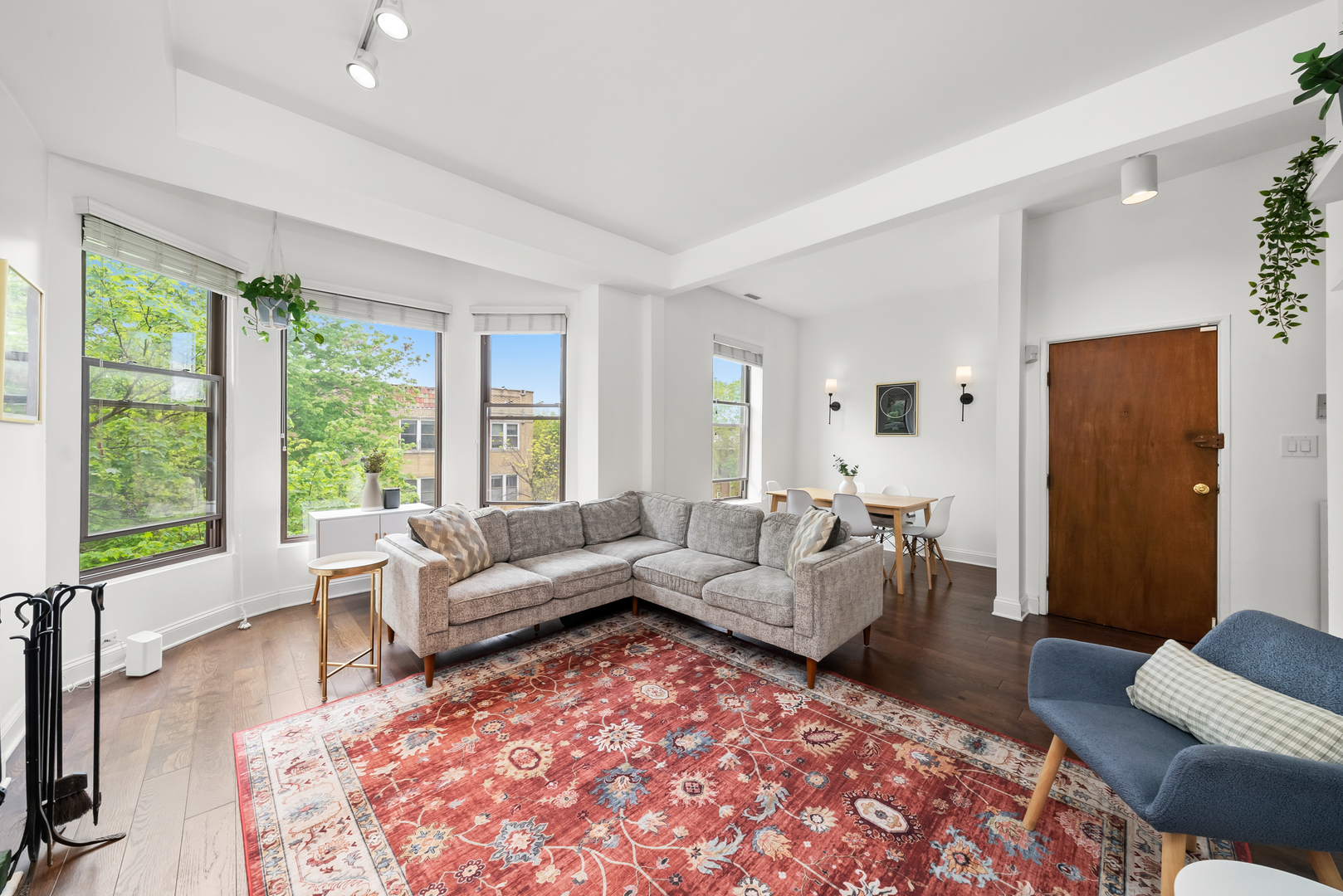 3055 North Seminary Avenue, Unit 3S Chicago, IL 60657 - Photo 5 of 23 a living room with furniture and a large window