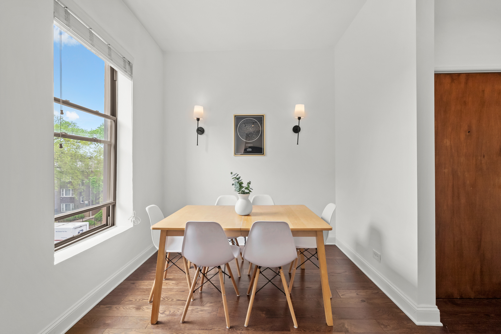 3055 North Seminary Avenue, Unit 3S Chicago, IL 60657 - Photo 10 of 23 a view of a dining room with furniture and wooden floor