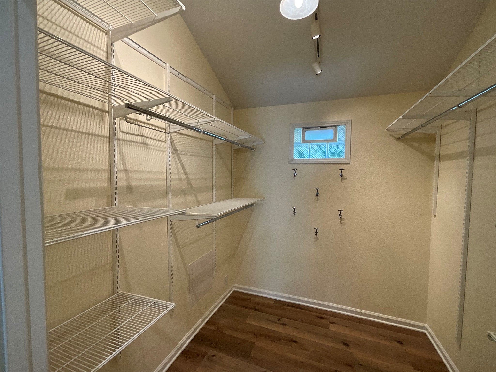 15702 Racine Cove Austin, TX 78717 - Photo 17 of 27 Ample storage solutions abound in this well-appointed walk-in closet.